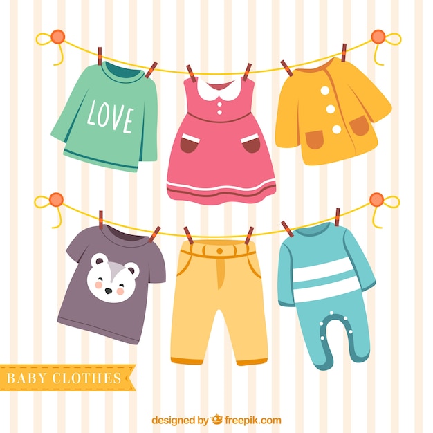 Download Nice baby clothes hanging on a rope | Free Vector