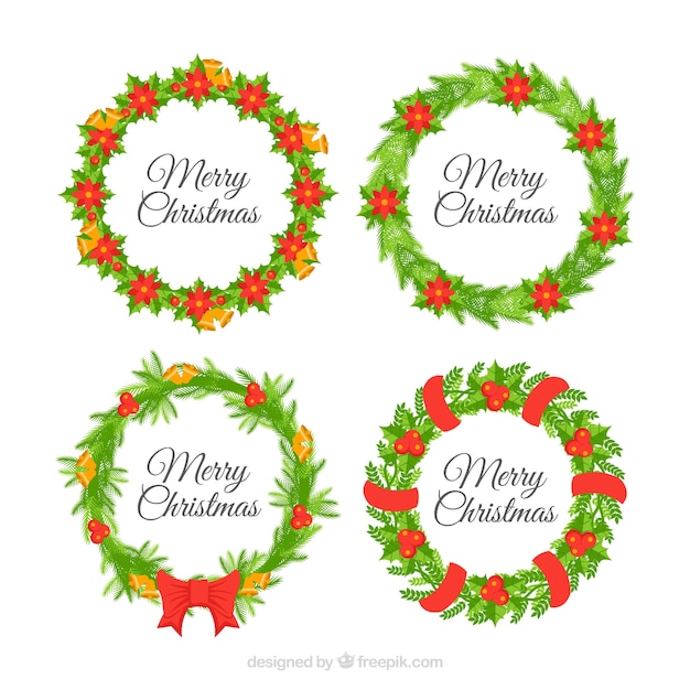 Free Vector | Pack of four hand drawn christmas floral wreaths