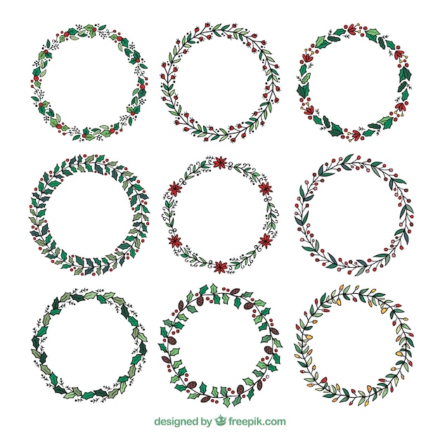 Free Vector | Pack of hand drawn christmas retro wreaths