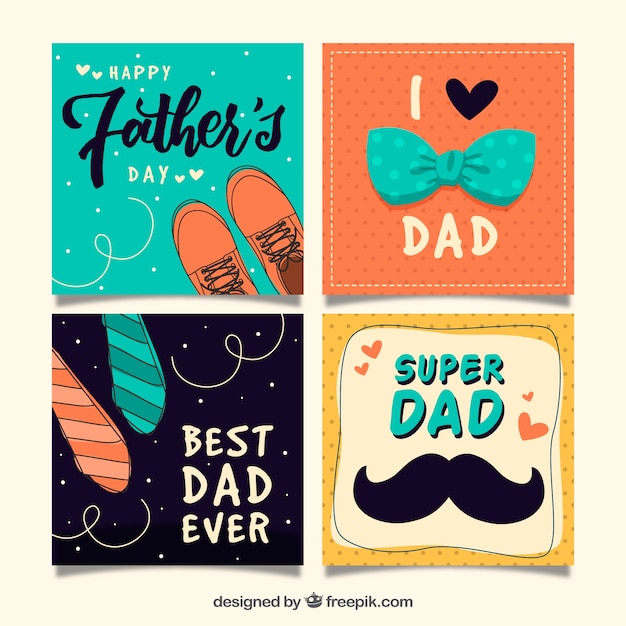 Pack of four father\'s day cards with decorative\
elements