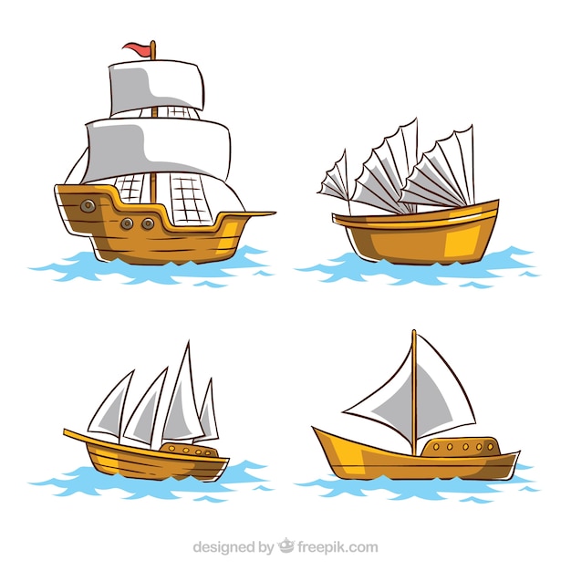 Pack of four wooden boats with white\
sails