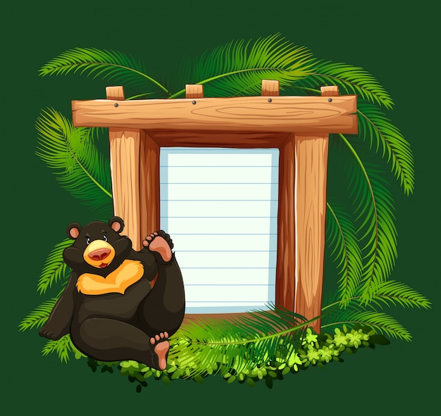 Paper template with bear in forest\
background