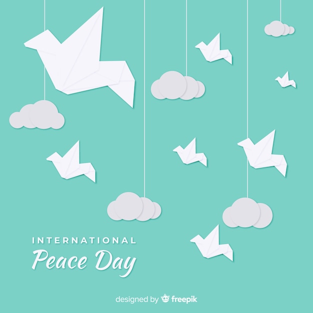 折り紙の鳩と平和の日の概念 プレミアムベクター