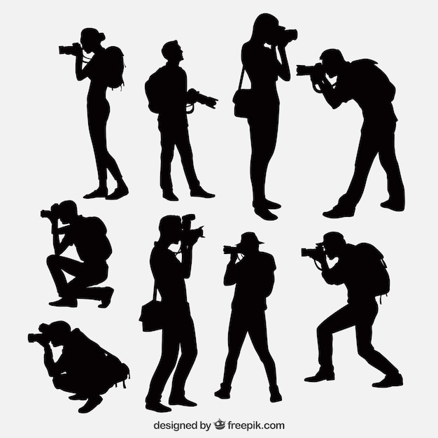 Photographers with camera silhouettes Free Vector