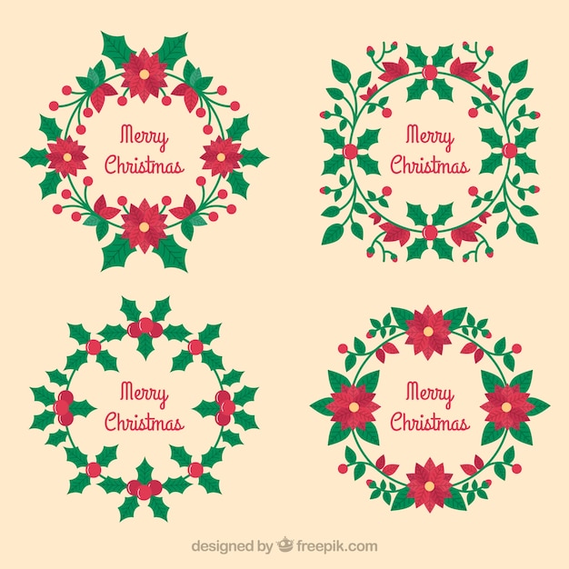 Download Pretty floral christmas wreaths | Free Vector