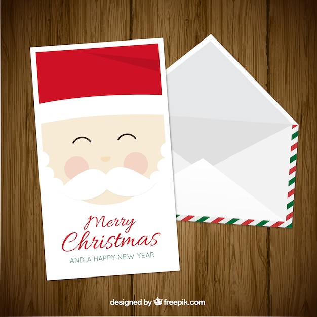 Pretty santa claus card with envelope Vector | Free Download