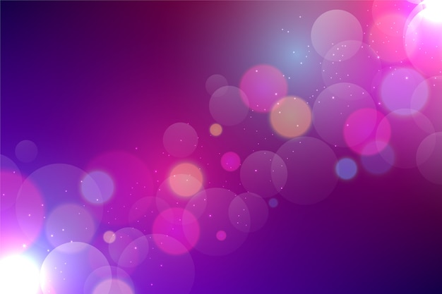 Free Vector Purple Bokeh Background With Sparkly Particles