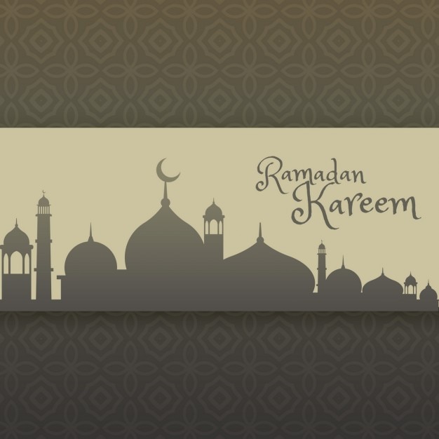Ramadan kareem greeting with mosque\
silhouette