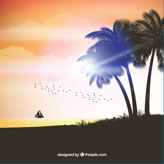 Realistic summer sunset with palm\
silhouettes