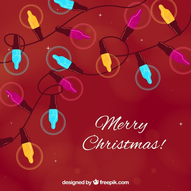 Red background of colorful christmas
lights