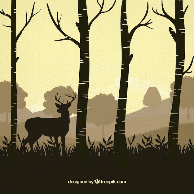 Download Free Vector | Reindeer between trees silhouettes background