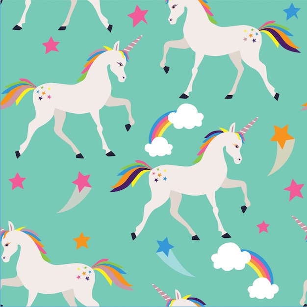 Premium Vector | Seamless pattern with unicorns, stars and clouds.