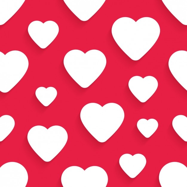 Seamless red background with white\
hearts