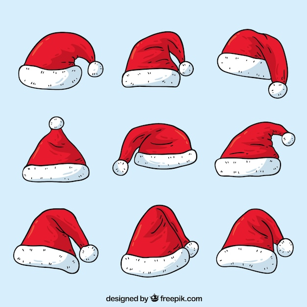 Download Free Vector | Set of hand drawn santa claus hats