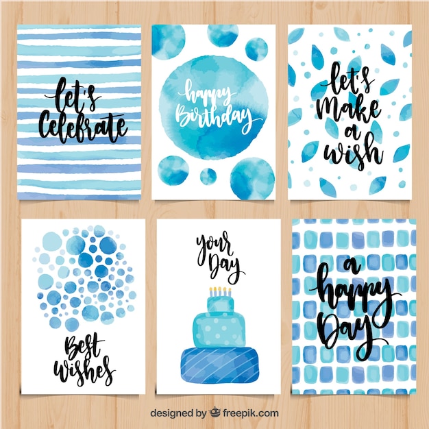 Set of watercolor birthday cards in blue
tones