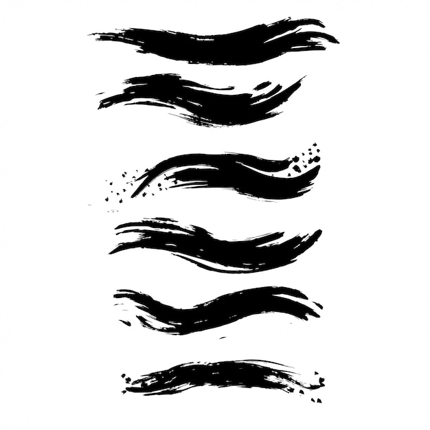 Premium Vector | Set of rough inky brush strokes.