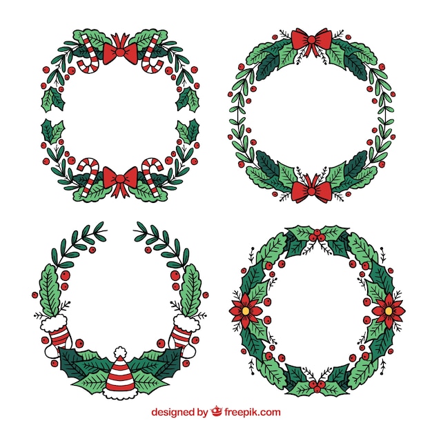 Download Set of simple hand drawn christmas wreaths Vector | Free ...