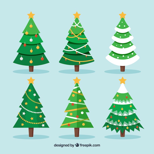 Several christmas trees in flat design Vector | Free Download