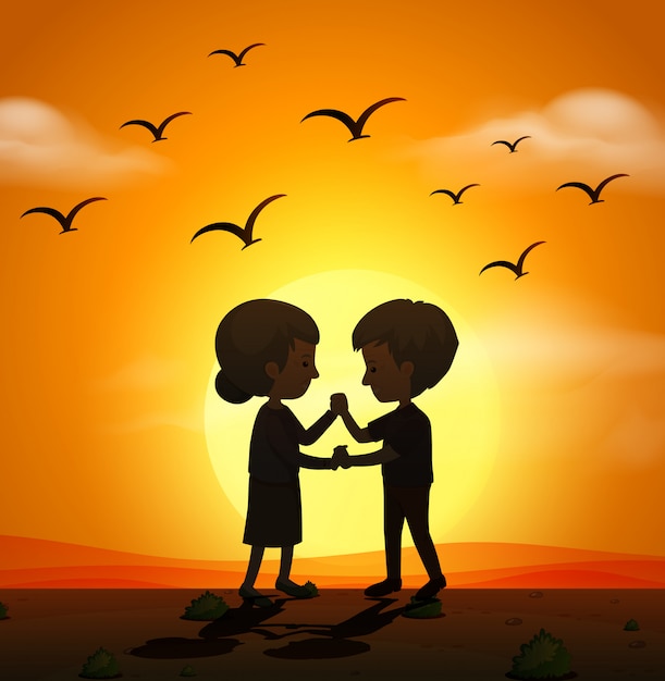 Silhouette scene with love couple holding hands at sunset ...
