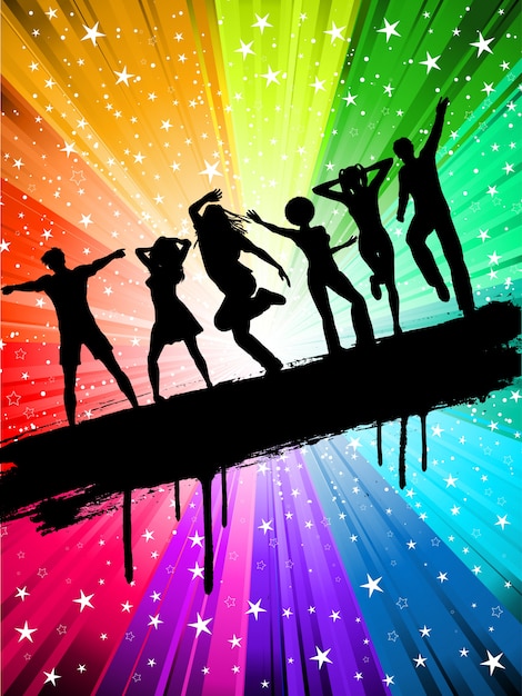 Silhouettes of people dancing on a starry multi\
coloured background