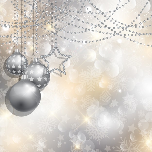 Silver balls on a bokeh background Vector | Free Download