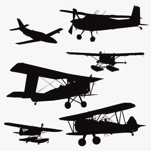 Small plane silhouettes | Premium Vector