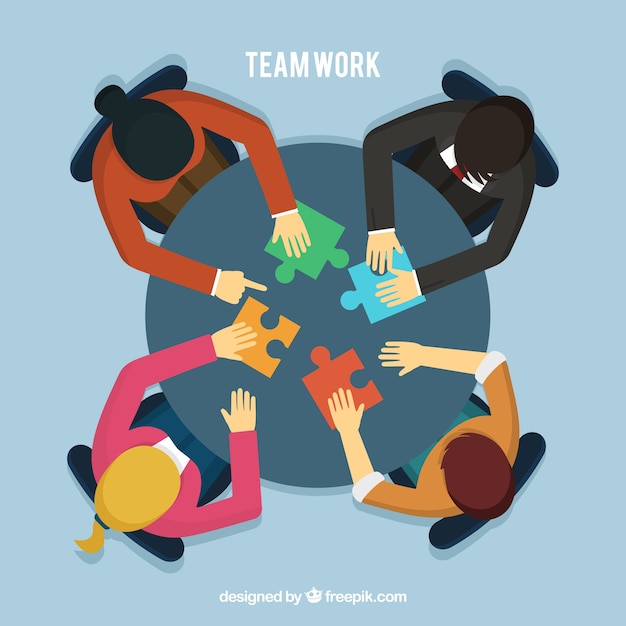 Free Vector | Teamwork concept with people at table