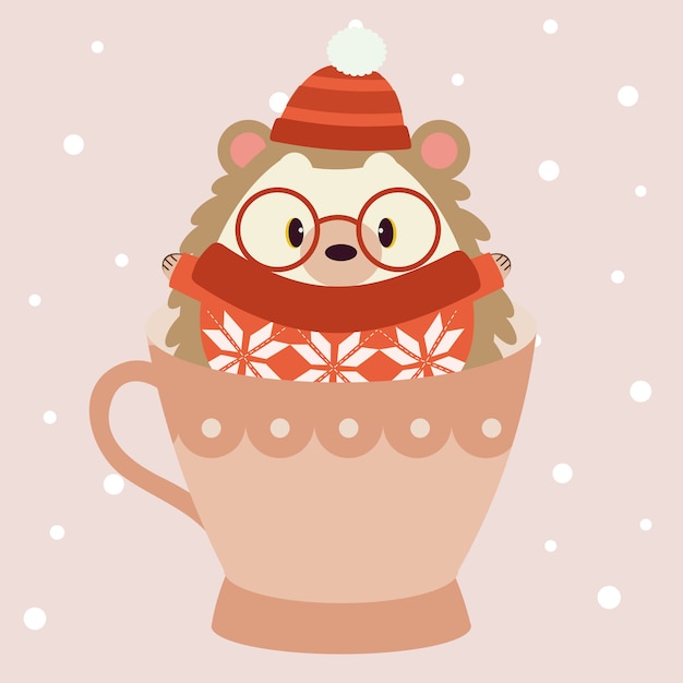 かわいいハリネズミのキャラクターは赤い冬の帽子と大きなメガネと赤いセーターを着て 大きなピンクのカップに座っています プレミアムベクター