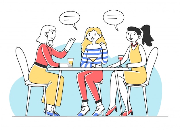 Three girls sitting at table in cafe and talking | Premium Vector