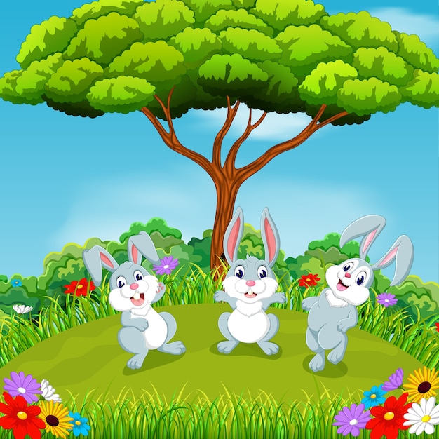 Premium Vector Three rabbit with beatiful scenary