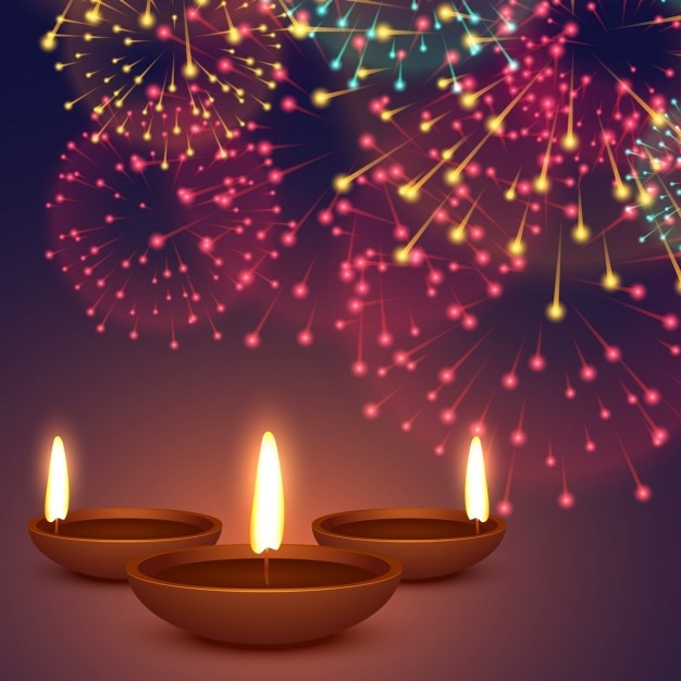 Three realistic candles with fireworks for\
diwali