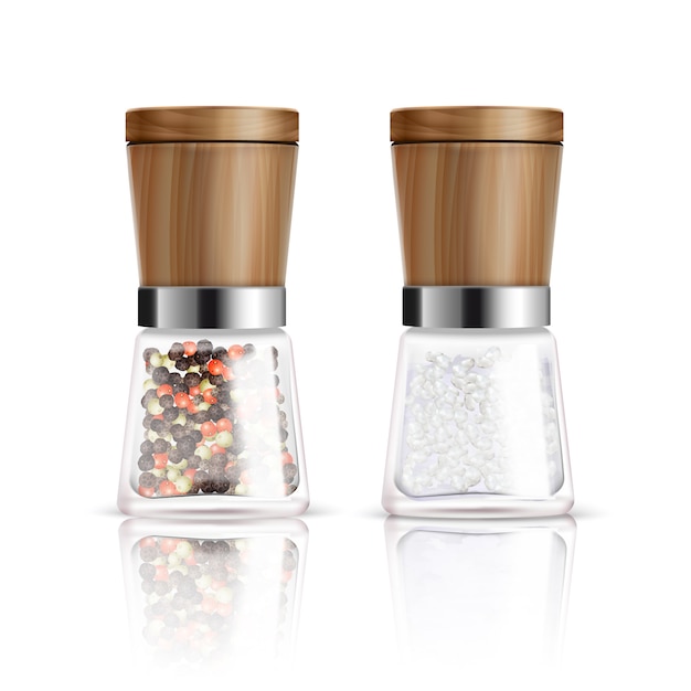 Two isolated realistic salt and pepper mill composition with glass container and wooden cover vector illustration Free Vector