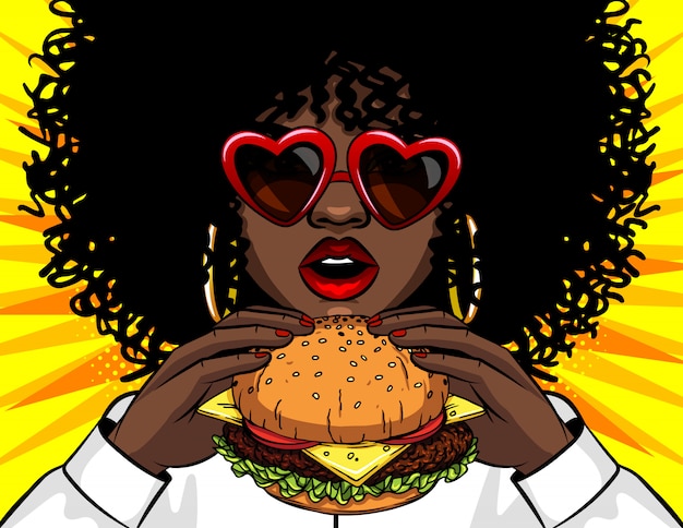 ハンバーガーを食べるベクトルバナーアフリカ系アメリカ人女性 おいしいサンドイッチを保持している女性の手を描くコミック漫画ポップアートレトロなベクトル イラスト プレミアムベクター