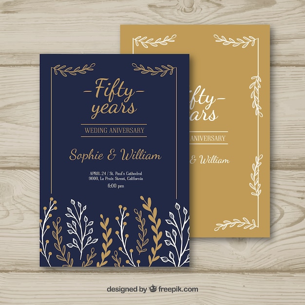  Wedding  anniversary  card  with floral ornaments in hand 