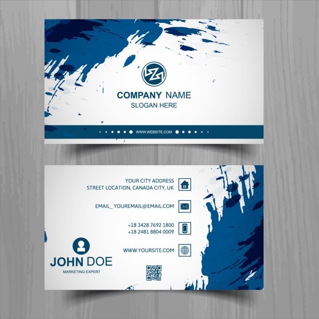 White business card with blue paint spots Free Vector