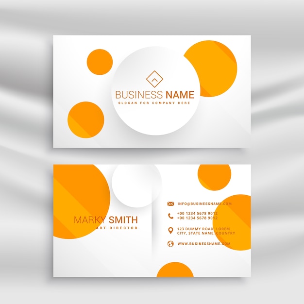 White business card with yellow circles
