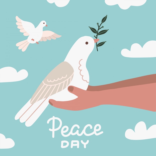 人間の手で座っているオリーブの枝と白い鳩 平和のシンボル 鳩分離ロゴ 白い飛ぶ鳥のエンブレム フラット鳩フラット記号 空と雲と平和の日イラスト プレミアムベクター