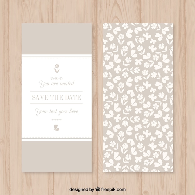 White flowers wedding card in beige
color