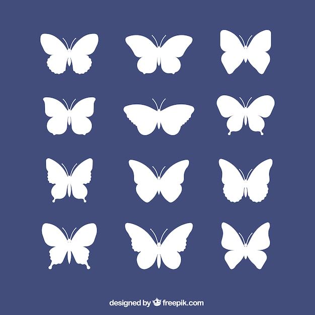 White silhouettes set of butterflies
