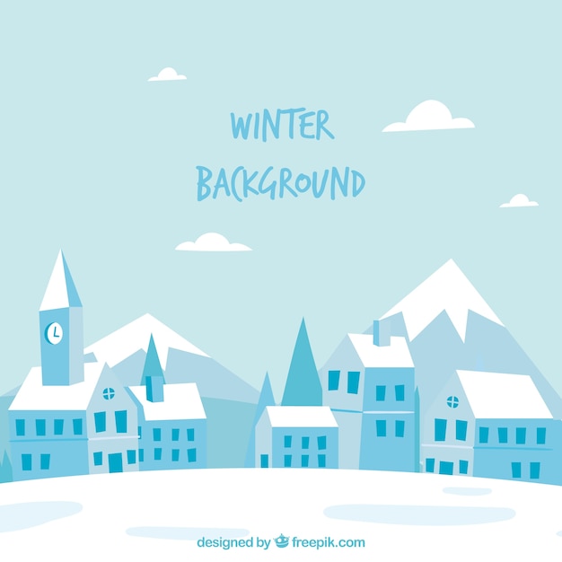 Winter background with a town by the
mountains