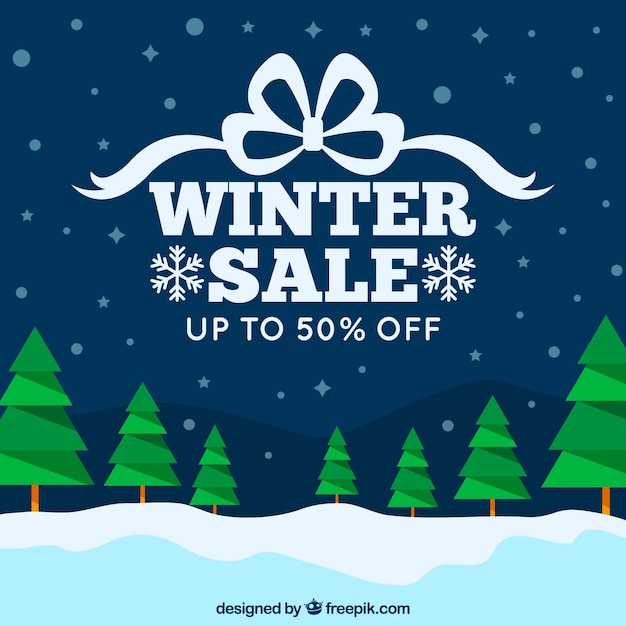 Download Free Vector | Winter sale background with pine trees