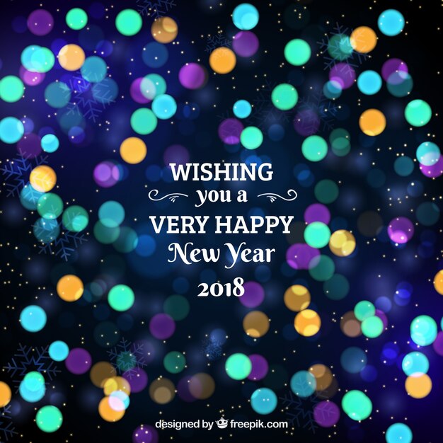 Wishing you a happy new year blurred
background