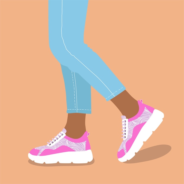 Woman legs in trendy sneakers 