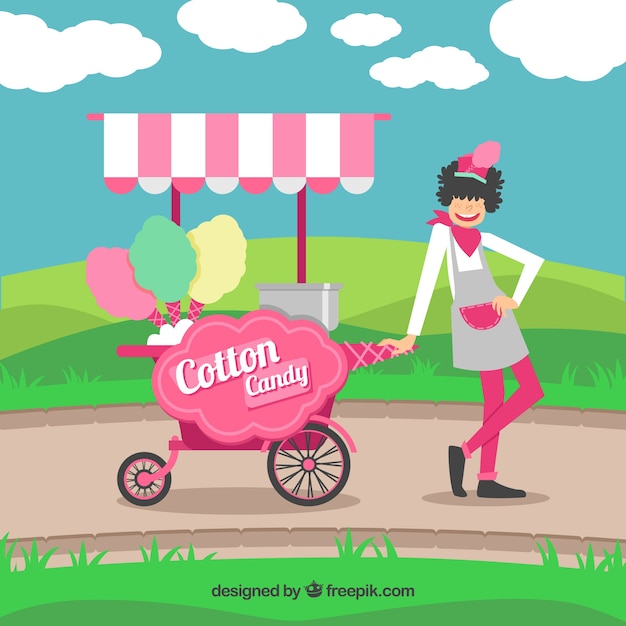 Woman with cotton candy cart in the park