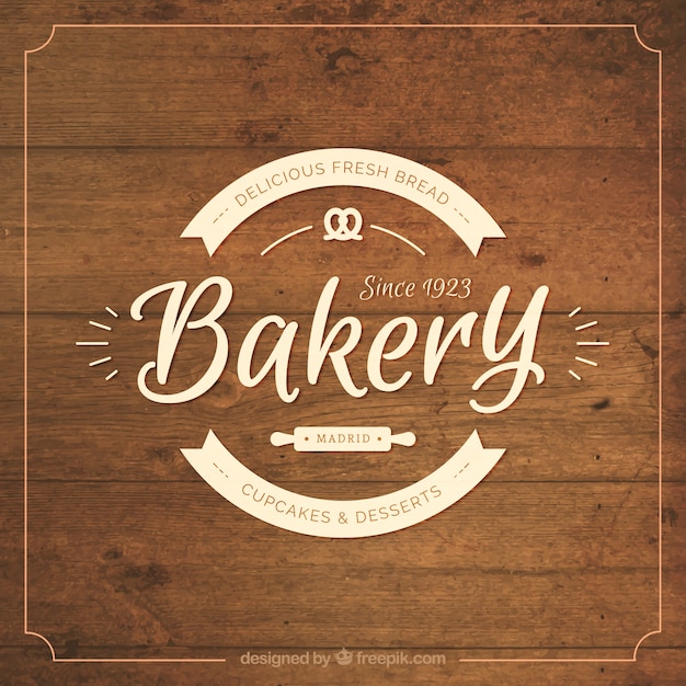 Download Free Wooden Background With Bakery Badge Free Vector Use our free logo maker to create a logo and build your brand. Put your logo on business cards, promotional products, or your website for brand visibility.