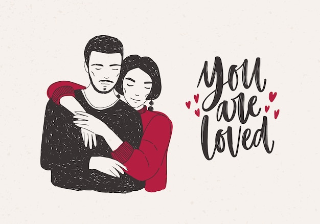 Premium Vector Young Woman Standing Behind Man And Warmly Embracing Him And You Are Loved Hand Lettering Decorated With Tiny Hearts Loving Romantic Couple