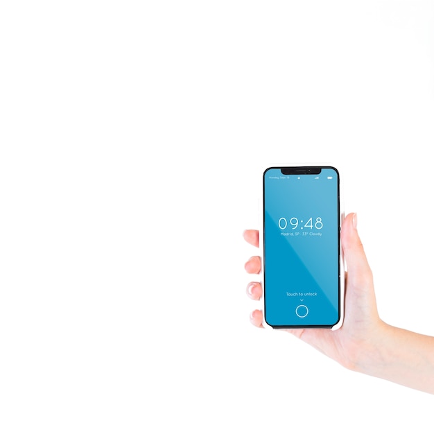 Hand, die smartphonemodell hält Kostenlosen PSD
