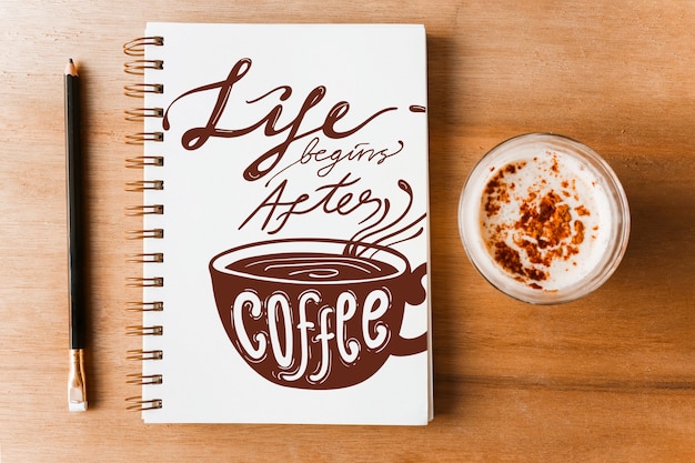 Notebook-cover-modell mit kaffee-konzept Kostenlosen PSD