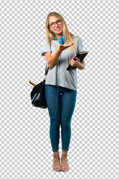 Studentenmädchen mit den gläsern, die ein produkt oder eine idee beim schauen in richtung lächeln darstellen Premium PSD