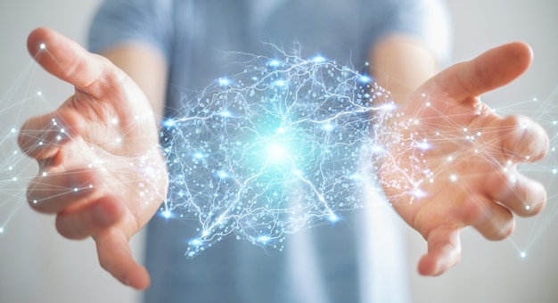 Homme d'affaires utilisant le rendu 3d d'interface de cerveau humain de rayons x numérique Photo Premium
